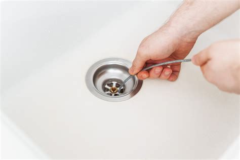 Dealing with Stubborn Clogs: Utilizing a Plumber's Snake