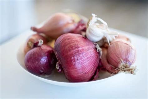 Delving into the Hidden Significance of Cooking Onions in Dreams