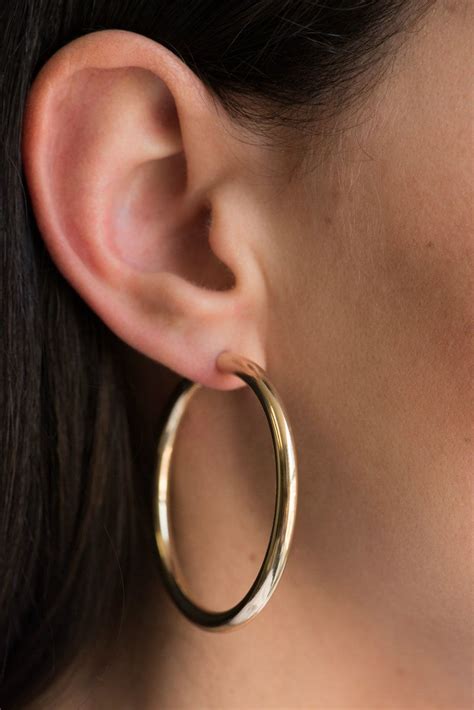 The History of Gold Hoop Earrings: A Timeless Fashion Statement