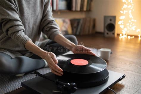 The Ritual of Setting up and Enjoying a Vinyl Record