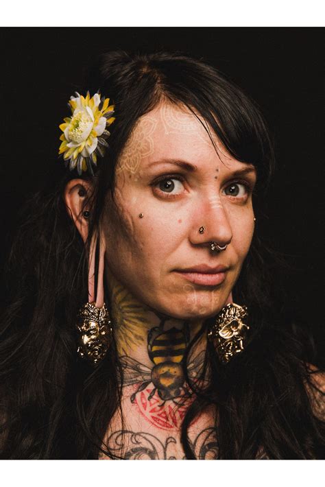 Unveiling the Enchantment of Body Modification: The Magnetic Appeal of Tattoos